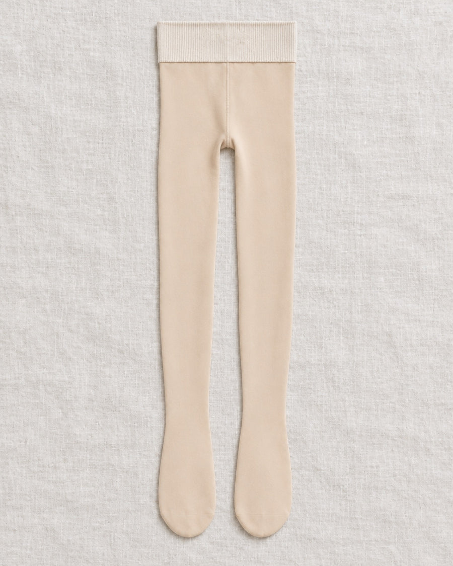 Collant Névéa vu de l'extérieur : voile fin couleur peau